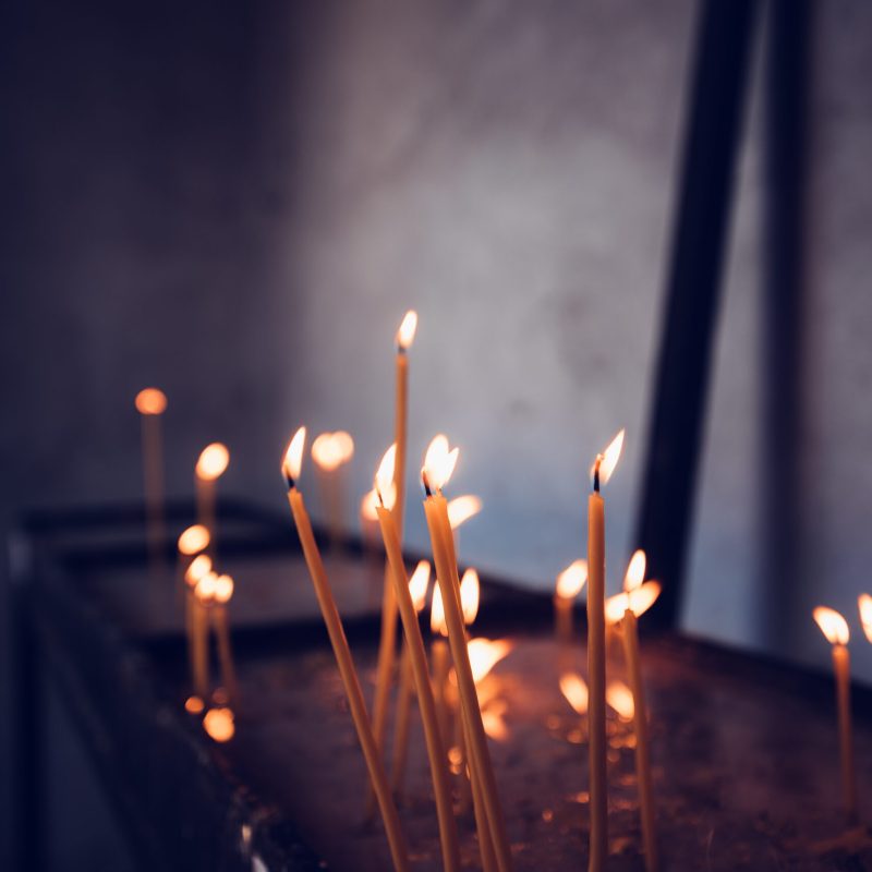Church candles burning, selective focus