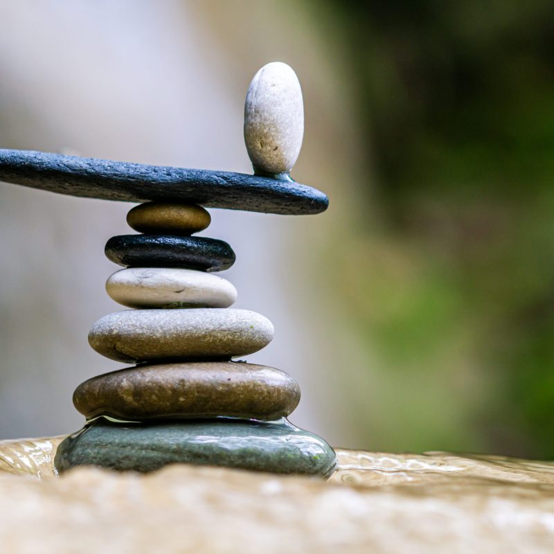 Balanced Zen stones pebbles at the waterfalls